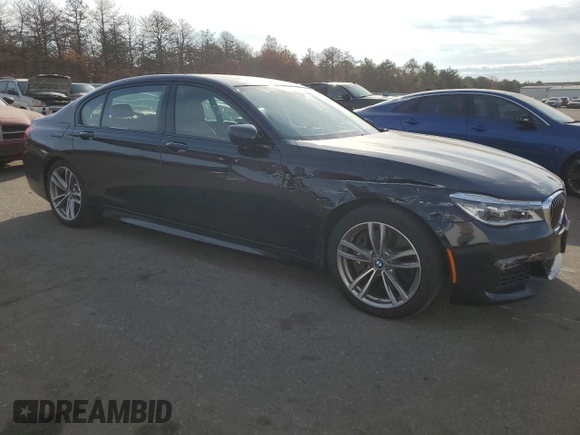 2016 BMW 7 Series 750i xDrive с VIN WBA7F2C53GG420706, выставлен на аукционе Copart как лот 76697534 с пробегом 59 885 миль миль и Чистый • Clean title. История ставок и продаж доступна на DreamBid. Изображение 4.