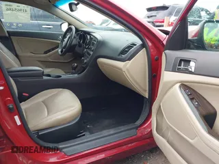 2013 Kia Optima EX z VIN 5XXGN4A78DG143138, wystawiony jako IAAI lot #41965486 z przebiegiem 73 795 mil mil oraz . Historia ofert i sprzedaży dostępna na DreamBid. Obrazek 5.