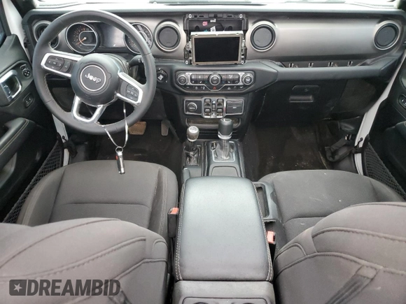 2023 Jeep Gladiator Overland z VIN 1C6HJTFG6PL516742, wystawiony jako Copart lot #65762465 z przebiegiem Nie podano mil oraz Szkoda całkowita • Salvage title. Historia ofert i sprzedaży dostępna na DreamBid. Obrazek 8.