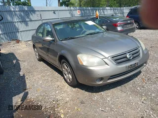 2002 Nissan Altima SL z VIN 1N4AL11D72C183312, wystawiony jako IAAI lot #42425412 z przebiegiem 167 195 mil mil oraz . Historia ofert i sprzedaży dostępna na DreamBid. Obrazek 1.