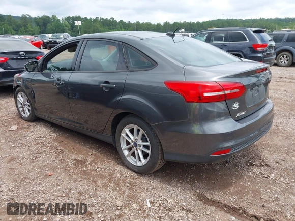2016 Ford Focus SE z VIN 1FADP3F2XGL397092, wystawiony jako IAAI lot #42619802 z przebiegiem 232 252 mil mil oraz . Historia ofert i sprzedaży dostępna na DreamBid. Obrazek 3.