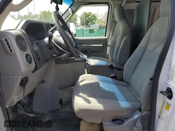 2014 Ford Econoline Cargo Commercial with VIN 1FTNE2EW3EDA33705, listed as a Copart auction lot 60919935 with 174,371 mi miles and Salvage title. Bid and sale history available at DreamBid. Image 7.