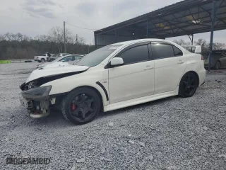 2013 Mitsubishi Lancer Evolution GSR with VIN JA32W8FVXDU024537, listed as a Copart auction lot 44785195 with 180832 miles and Salvage Title. Bid and sale history available at carsss.com. Image 1.