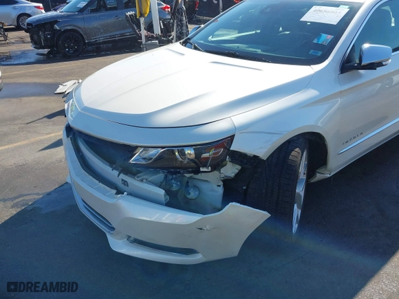 2014 Chevrolet Impala LTZ with VIN 2G1155S32E9206212, listed as a IAAI auction lot 40686005 with 76,750 mi miles. Bid and sale history available at carsss.com. Image 6.