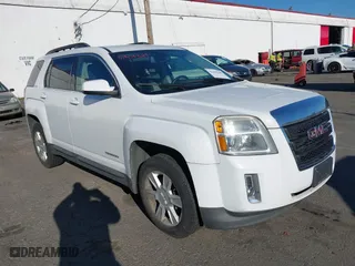 2010 GMC Terrain SLE-2 with VIN 2CTALDEW2A6381203, listed as a IAAI auction lot 41404389 with 128,082 mi miles. Bid and sale history available at carsss.com. Image 1.
