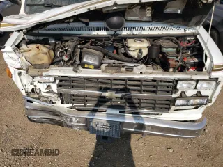 1992 Chevrolet Chevy Van z VIN 2GBEG25K3N4117707, wystawiony jako Copart lot #67318524 z przebiegiem 181 994 mil mil oraz Szkoda całkowita • Salvage title. Historia ofert i sprzedaży dostępna na DreamBid. Obrazek 12.