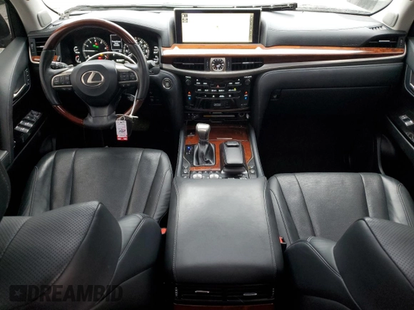 2019 Lexus LX 570 with VIN JTJHY7AX7K4310302, listed as a Copart auction lot 82034744 with 96,980 mi miles and Salvage title. Bid and sale history available at DreamBid. Image 8.