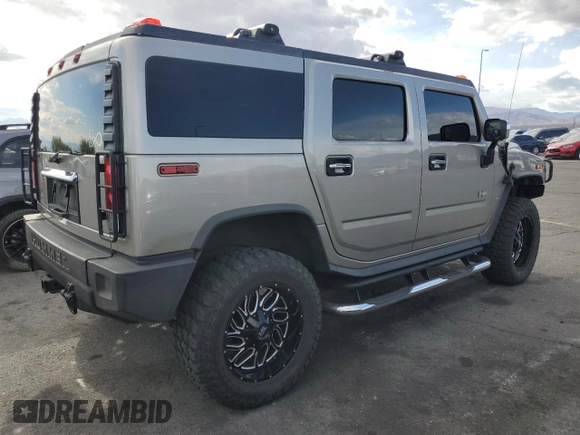 2005 Hummer H2 SUV z VIN 5GRGN23U65H106597, wystawiony jako Copart lot #54508345 z przebiegiem Nie podano mil oraz Szkoda całkowita • Salvage title. Historia ofert i sprzedaży dostępna na DreamBid. Obrazek 3.