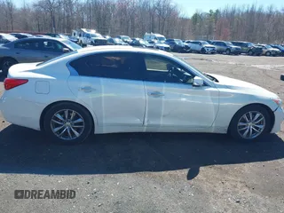 2014 Infiniti Q50 Sport with VIN JN1BV7AP7EM679296, listed as a IAAI auction lot 41834654 with 126,337 mi miles and . Bid and sale history available at DreamBid. Image 13.
