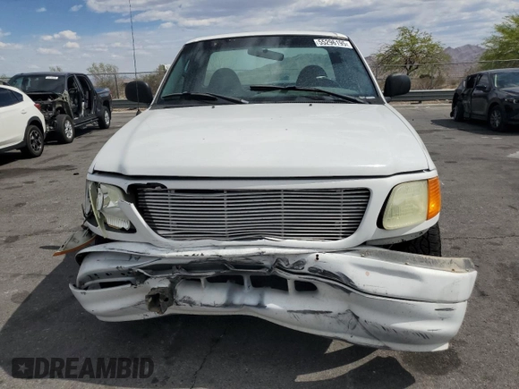 2004 Ford F-150 XL with VIN 2FTRF17294CA59985, listed as a Copart auction lot 55296195 with 220,933 mi miles and Salvage title. Bid and sale history available at DreamBid. Image 5.