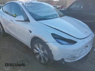 2023 Tesla Model Y Long Range z VIN 7SAYGDEE7PF683016, wystawiony jako IAAI lot #41342757 z przebiegiem 25 895 mil mil oraz . Historia ofert i sprzedaży dostępna na DreamBid. Obrazek 1.