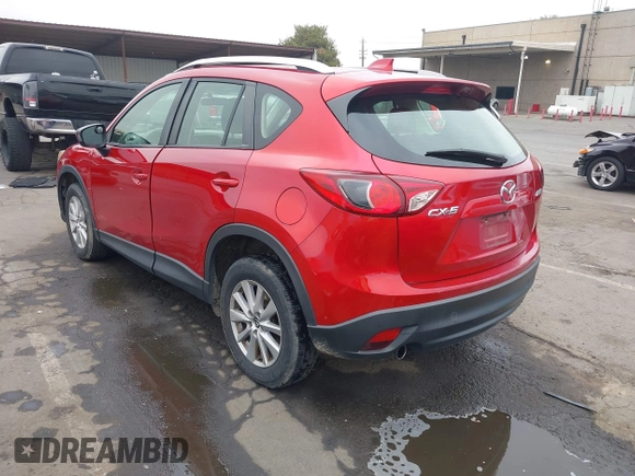 2015 Mazda CX-5 Sport z VIN JM3KE2BE9F0452625, wystawiony jako IAAI lot #42114867 z przebiegiem 167 849 mil mil oraz . Historia ofert i sprzedaży dostępna na DreamBid. Obrazek 3.