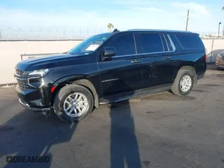 2021 Chevrolet Suburban LT with VIN 1GNSCCKD2MR328577, listed as a IAAI auction lot 41478279 with 128,060 mi miles. Bid and sale history available at carsss.com. Image 2.