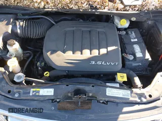 2014 Chrysler Town & Country Limited with VIN 2C4RC1GGXER176316, listed as a IAAI auction lot 41423119 with 150,109 mi miles and . Bid and sale history available at DreamBid. Image 10.