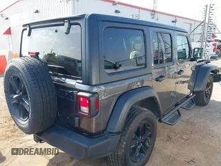2022 Jeep Wrangler Unlimited Sport S with VIN 1C4HJXDG5NW105931, listed as a IAAI auction lot 42349628 with 37,314 mi miles and . Bid and sale history available at DreamBid. Image 4.