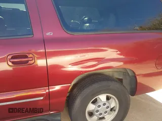 2002 Chevrolet Suburban LT with VIN 1GNEC16Z02J229078, listed as a IAAI auction lot 41737482 with 306,502 mi miles and . Bid and sale history available at DreamBid. Image 12.