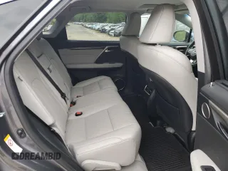 2016 Lexus RX 450h z VIN 2T2BGMCA0GC001306, wystawiony jako Copart lot #57262465 z przebiegiem 50 891 mil mil oraz Szkoda całkowita • Salvage title. Historia ofert i sprzedaży dostępna na DreamBid. Obrazek 11.