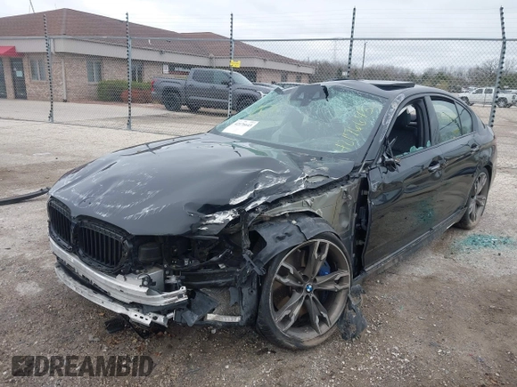 2018 BMW 5 Series M550i xDrive with VIN WBAJB9C56JB286742, listed as a IAAI auction lot 42176643 with 61,445 mi miles and . Bid and sale history available at DreamBid. Image 6.