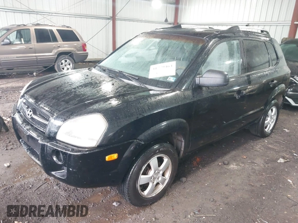 2005 Hyundai Tucson GL with VIN KM8JM12B75U072080, listed as a IAAI auction lot 41779464 with 191,771 mi miles. Bid and sale history available at carsss.com. Image 2.