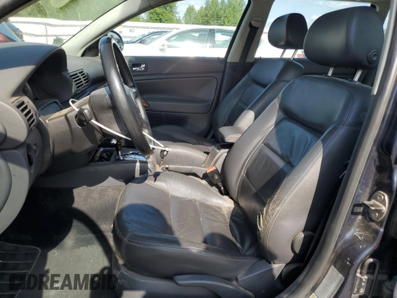 2005 Volkswagen Passat GLS z VIN WVWCE63B95E042241, wystawiony jako Copart lot #60874005 z przebiegiem 197 761 mil mil oraz Szkoda całkowita • Salvage title. Historia ofert i sprzedaży dostępna na DreamBid. Obrazek 7.