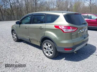 2013 Ford Escape SEL with VIN 1FMCU0HX3DUB37785, listed as a IAAI auction lot 41863069 with 179,508 mi miles. Bid and sale history available at carsss.com. Image 3.