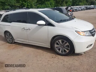 2015 Honda Odyssey Touring Elite with VIN 5FNRL5H96FB045968, listed as a IAAI auction lot 42263637 with 207,637 mi miles and . Bid and sale history available at DreamBid. Image 1.