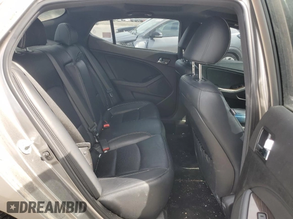2013 Kia Optima SX z VIN 5XXGR4A63DG167343, wystawiony jako Copart lot #57677305 z przebiegiem 161 446 mil mil oraz Czysty tytuł • Clean title. Historia ofert i sprzedaży dostępna na DreamBid. Obrazek 10.