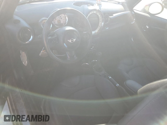 2013 MINI Convertible S with VIN WMWZP3C50DT550554, listed as a Copart auction lot 88415495 with 95,295 mi miles and Salvage title. Bid and sale history available at DreamBid. Image 8.