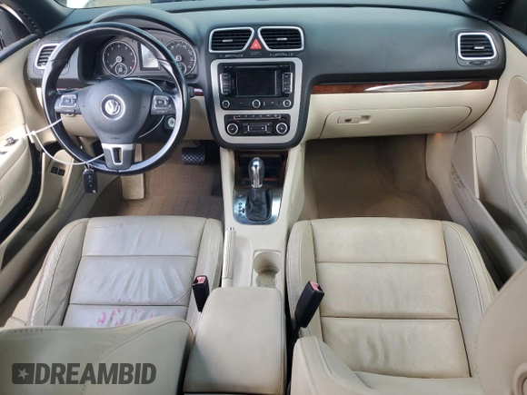 2012 Volkswagen Eos Lux with VIN WVWFW7AH8CV018727, listed as a Copart auction lot 51332135 with 104,636 mi miles and Salvage Title. Bid and sale history available at DreamBid. Image 8.
