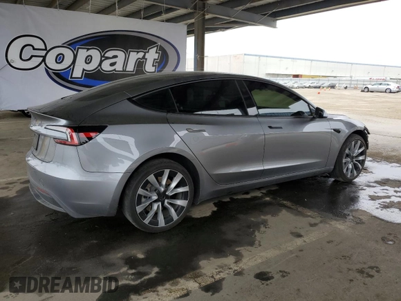 2024 Tesla Model 3 z VIN 5YJ3E1EA0RF859934, wystawiony jako Copart lot #52962285 z przebiegiem 32 329 mil mil oraz Szkoda całkowita • Salvage title. Historia ofert i sprzedaży dostępna na DreamBid. Obrazek 3.