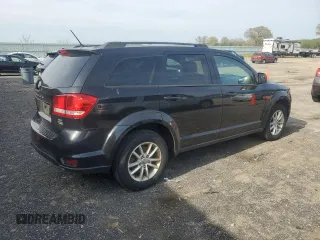 2013 Dodge Journey SXT with VIN 3C4PDCBG8DT601096, listed as a Copart auction lot 56187835 with 142,731 mi miles and Clean Title. Bid and sale history available at DreamBid. Image 3.