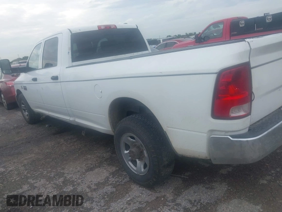 2012 Ram 2500 ST z VIN 3C6TD4HL7CG265349, wystawiony jako IAAI lot #42479271 z przebiegiem 301 419 mil mil oraz . Historia ofert i sprzedaży dostępna na DreamBid. Obrazek 3.
