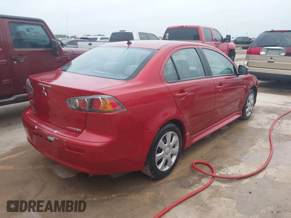 2015 Mitsubishi Lancer ES with VIN JA32U2FU7FU003772, listed as a IAAI auction lot 42127352 with 130,281 mi miles. Bid and sale history available at carsss.com. Image 4.