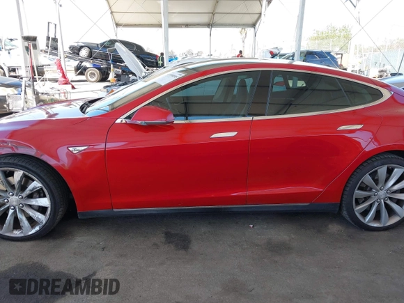 2013 Tesla Model S with VIN 5YJSA1DN8DFP25774, listed as a IAAI auction lot 41998095 with 135,671 mi miles and . Bid and sale history available at carsss.com. Image 15.