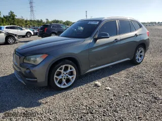 2014 BMW X1 sDrive28i with VIN WBAVM1C59EVW50475, listed as a Copart auction lot 52311335 with 126,820 mi miles and Salvage Title. Bid and sale history available at carsss.com. Image 1.