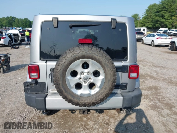 2015 Jeep Wrangler Unlimited Sahara with VIN 1C4BJWEG9FL570780, listed as a IAAI auction lot 42474940 with 116,226 mi miles and . Bid and sale history available at DreamBid. Image 17.