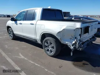 2020 Honda Ridgeline RTL-E with VIN 5FPYK3F76LB005008, listed as a IAAI auction lot 41662580 with 33,987 mi miles. Bid and sale history available at carsss.com. Image 3.