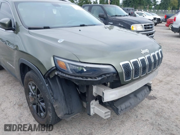 2019 Jeep Cherokee Latitude Plus z VIN 1C4PJMLB2KD191884, wystawiony jako IAAI lot #42647360 z przebiegiem 148 680 mil mil oraz . Historia ofert i sprzedaży dostępna na DreamBid. Obrazek 19.
