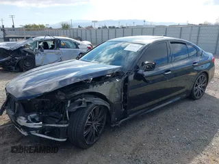 2017 BMW 5 Series 540i with VIN WBAJE5C33HG913604, listed as a IAAI auction lot 41559239 with 107,160 mi miles and . Bid and sale history available at carsss.com. Image 2.