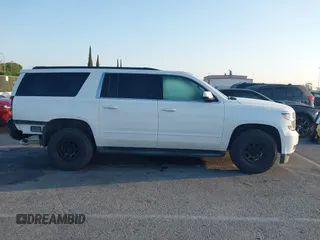 2018 Chevrolet Suburban LS with VIN 1GNSKGKC5JR173889, listed as a IAAI auction lot 42152865 with 73,358 mi miles and . Bid and sale history available at DreamBid. Image 13.