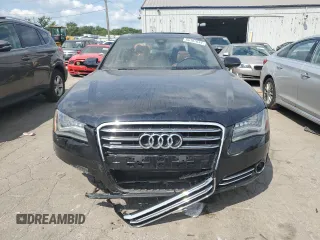 2011 Audi A8 z VIN WAURVAFD9BN005595, wystawiony jako Copart lot #66302644 z przebiegiem 106 610 mil mil oraz Nie do naprawy. Historia ofert i sprzedaży dostępna na DreamBid. Obrazek 5.