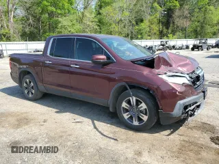 2017 Honda Ridgeline RTL-E with VIN 5FPYK3F74HB030612, listed as a Copart auction lot 50840125 with 218,068 mi miles and Salvage title. Bid and sale history available at DreamBid. Image 4.