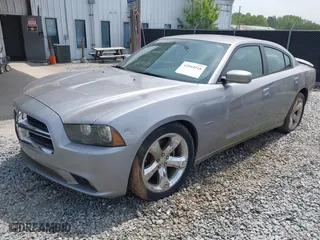 2014 Dodge Charger RT Plus with VIN 2C3CDXCT4EH220586, listed as a IAAI auction lot 42044918 with 199,304 mi miles. Bid and sale history available at carsss.com. Image 2.