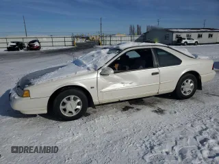 1995 Ford Thunderbird LX with VIN 1FALP62W4SH197312, listed as a Copart auction lot 44723355 with 175,537 mi miles and Salvage Title. Bid and sale history available at DreamBid. Image 1.