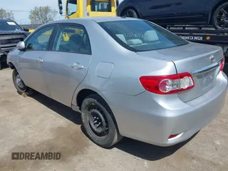 2011 Toyota Corolla L with VIN 2T1BU4EE1BC572731, listed as a IAAI auction lot 42024851 with 153,923 mi miles. Bid and sale history available at carsss.com. Image 3.