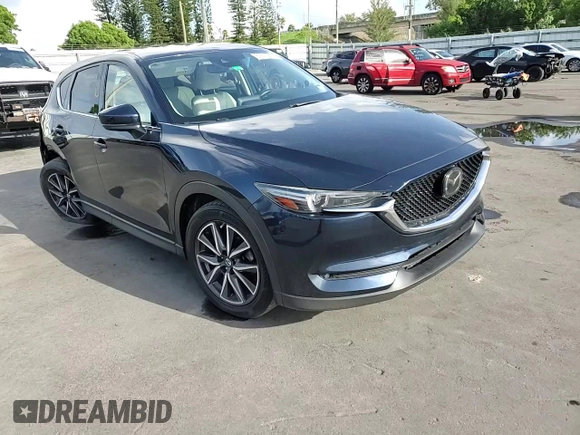 2018 Mazda CX-5 Grand Touring with VIN JM3KFADMXJ1353942, listed as a Copart auction lot 60570835 with 74,400 mi miles and Clean title. Bid and sale history available at DreamBid. Image 14.