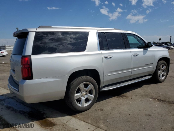 2020 Chevrolet Suburban Premier with VIN 1GNSCJKC0LR216855, listed as a Copart auction lot 72287114 with 94,642 mi miles and Salvage Title. Bid and sale history available at carsss.com. Image 3.