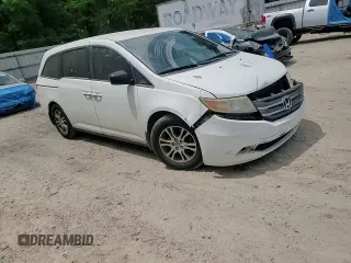 2013 Honda Odyssey EX z VIN 5FNRL5H43DB055987, wystawiony jako Copart lot #54001985 z przebiegiem 162 448 mil mil oraz Szkody całkowita. Historia ofert i sprzedaży dostępna na DreamBid. Obrazek 14.