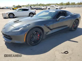2019 Chevrolet Corvette 1LT with VIN 1G1YB2D79K5105215, listed as a Copart auction lot 71198074 with 23,636 mi miles and Salvage Title. Bid and sale history available at carsss.com. Image 1.