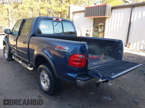 2002 Ford F-150 XLT with VIN 1FTRW086X2KE17566, listed as a IAAI auction lot 41721236 with 98,524 mi miles. Bid and sale history available at carsss.com. Image 3.